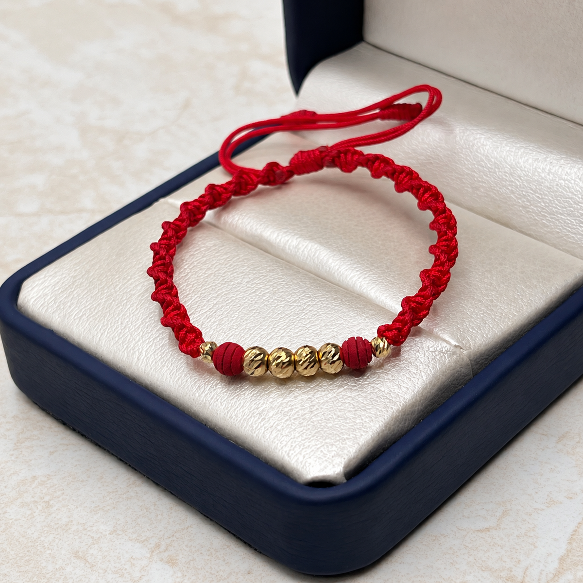 Pulsera tejida Balines #4 y #3 con neoprenos rojos Oro amarillo 18k 0,33 Gr