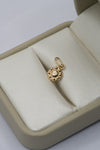 Dije flor redonda oro amarillo 18k 0,39 gr / 2,00 cm