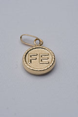 Dije FE oro amarillo 18k 0,66 gr / 2,3 mm / 1,8 cm