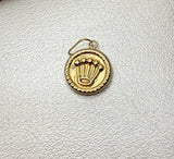 Dije RX oro amarillo 18k 0,52 gr / 2 cm