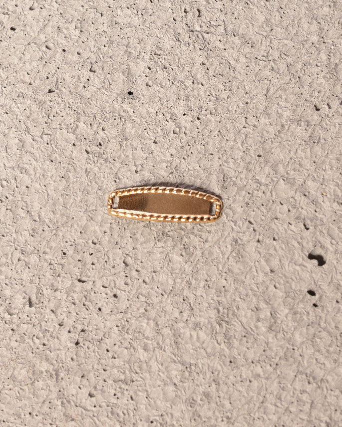 Herraje Placa Troquelada Oro amarillo 18k 0,42 Gr / 2,3 Cm