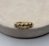 Anillo bolas diamantadas oro amarillo 18k / talla 6 / 0,95 gr / 1,6 mm