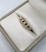 Anillo bolas diamantadas oro amarillo 18k / talla 7 / 0,97 gr / 1,58 mm